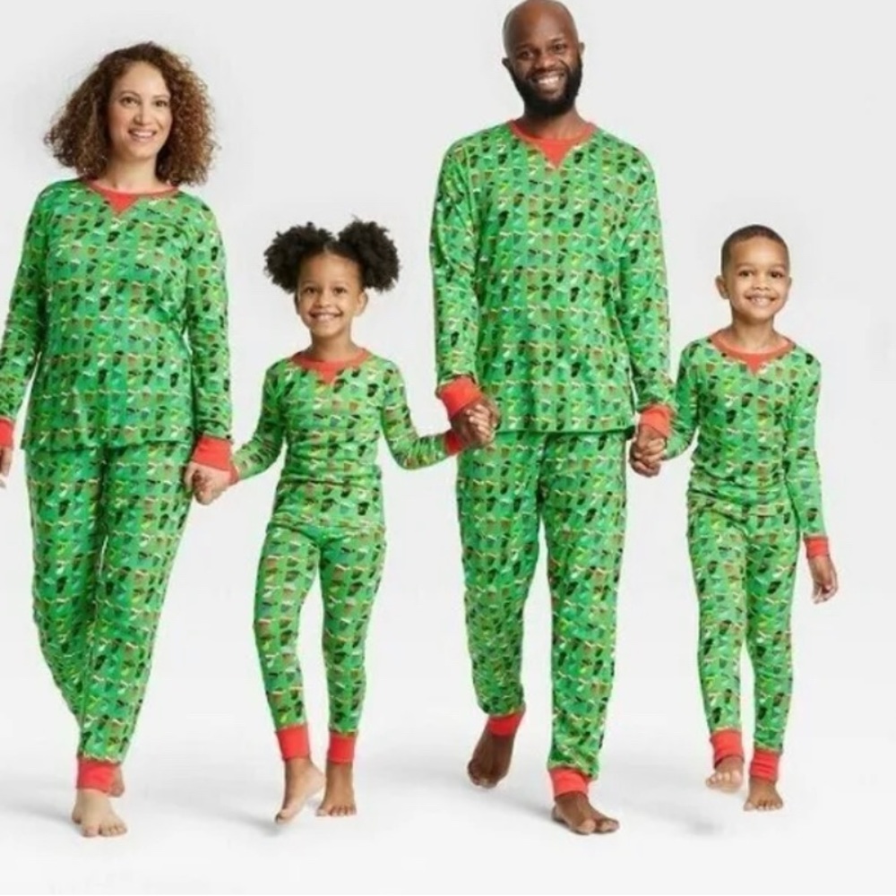 One pair of Women’s Black Santa Pajamas. Gently worn.
